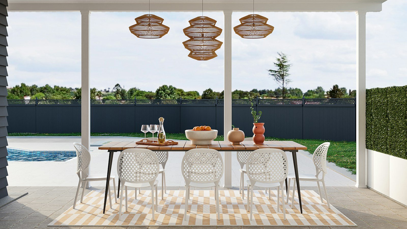 Terrasse couverte prolongeant le salon vers le jardin